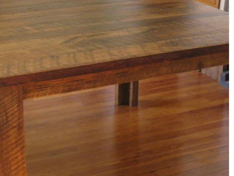 Reclaimed pine table over a refinished pine floor